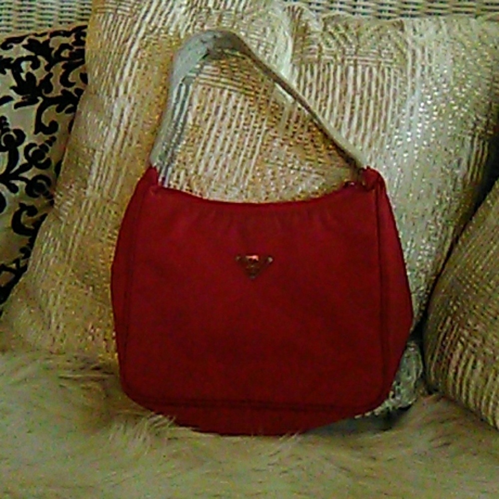 Authenic Prada small red clutch